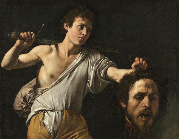 Baroque painting of the young David holding the severed head of Goliath.